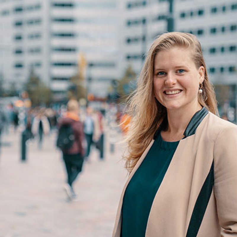 City background woman smiling at the camera.jpg PHOTOSHOP.jpg