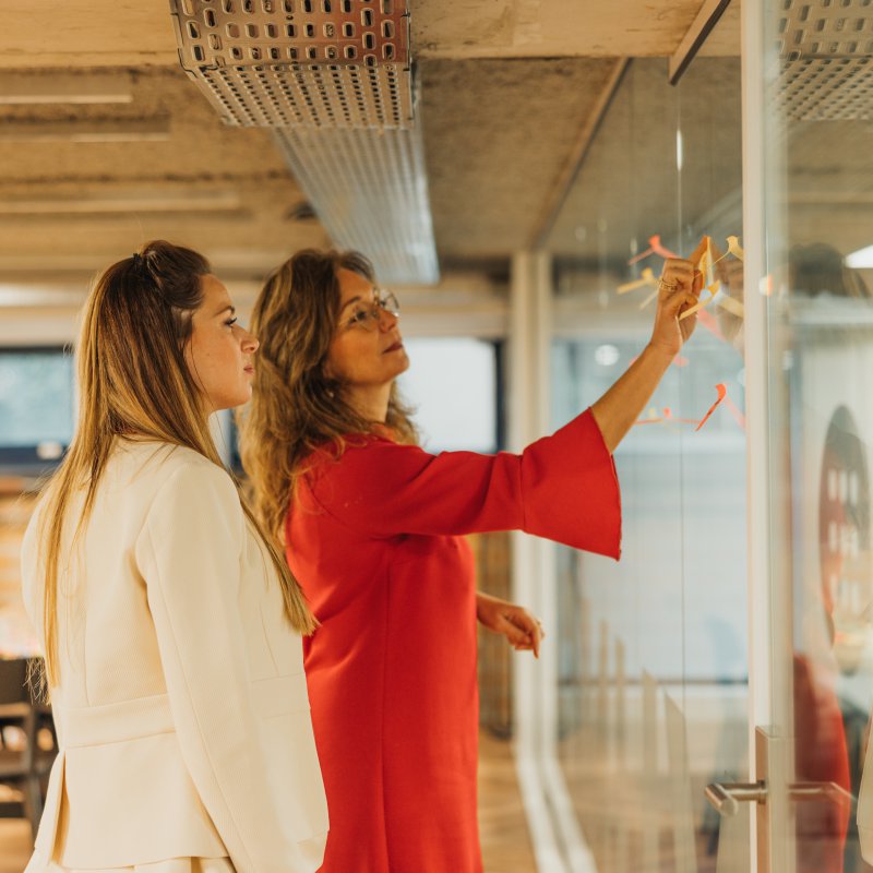 Two girls in conference room